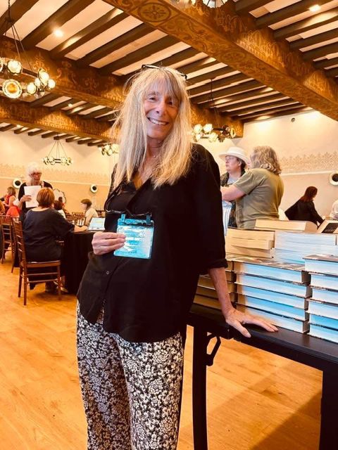 Sandy by the book tables at the Mar Monte Hotel